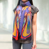 Gifts from Creator eco-scarf with Indigenous artwork – model wearing scarf