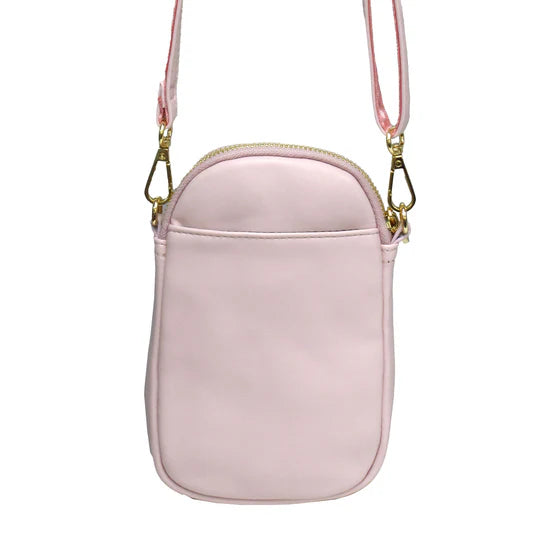 Pink crossbody bag with a strap on a white background