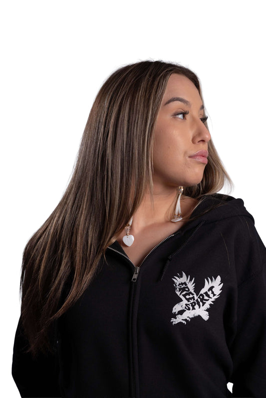 Woman wearing a black Free Spirit zip-up hoodie front view