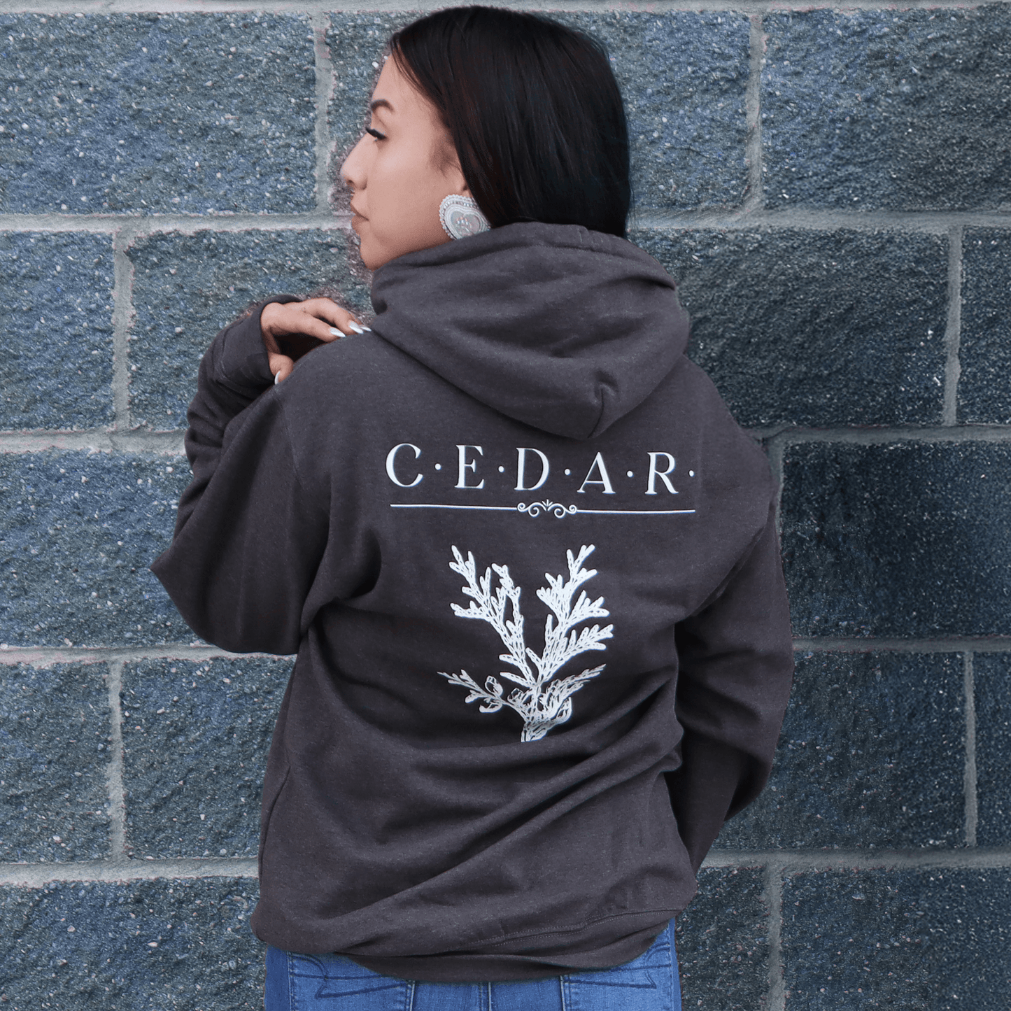 Back view of Cedar Medicine Hoodie with medicine print on the back