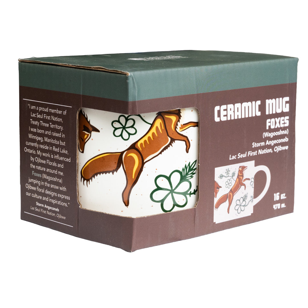 Ceramic mug with fox design in packaging on a white background