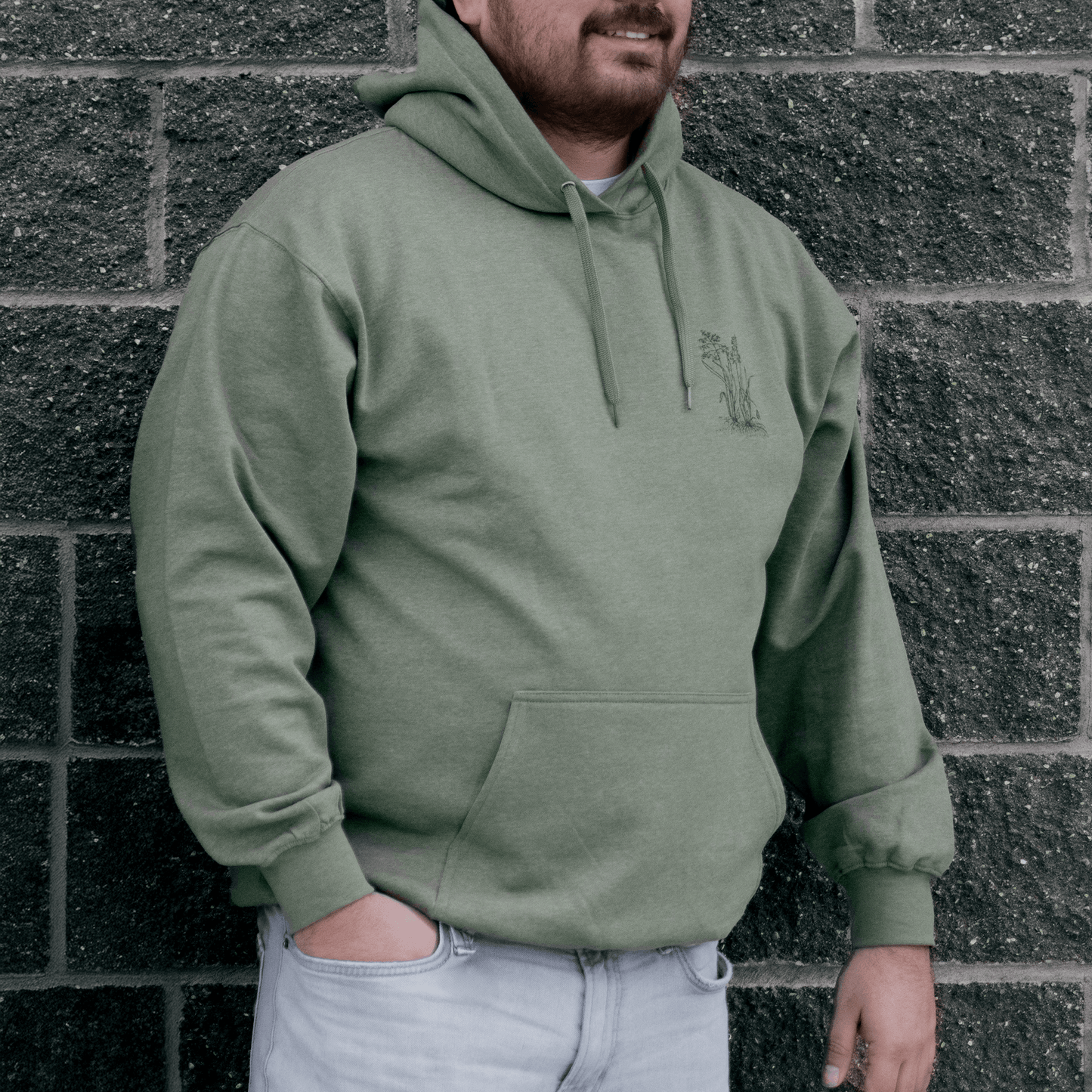 Front view of Sweetgrass Medicine Hoodie in green Indigenous streetwear inspired by tradition