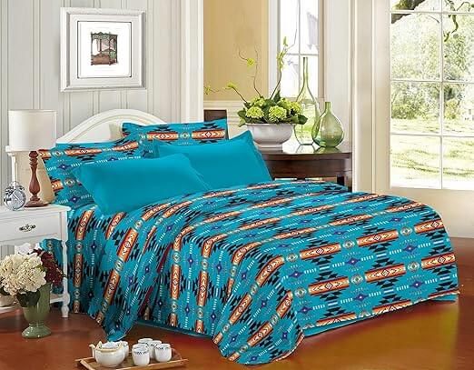 King 4pc Sheet Set – Turquoise displayed on a bed with Navajo print and matching pillow cases, perfect for stylish bedroom decor.