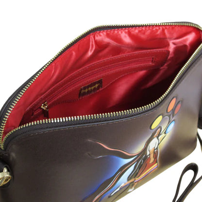Open handbag showing red interior and artistic design on a white background