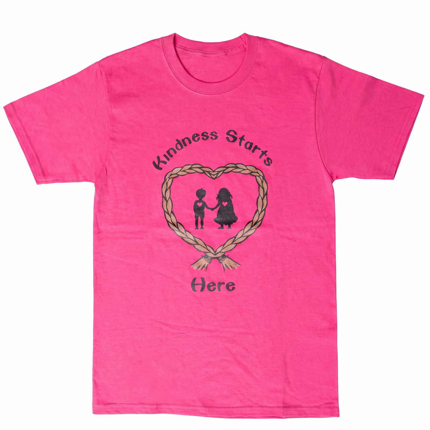 A bright pink short-sleeve t-shirt with a graphic on the front. The graphic features a braided heart outline with two small figures holding hands, the text 'Kindness Starts' above, and 'Here' below.