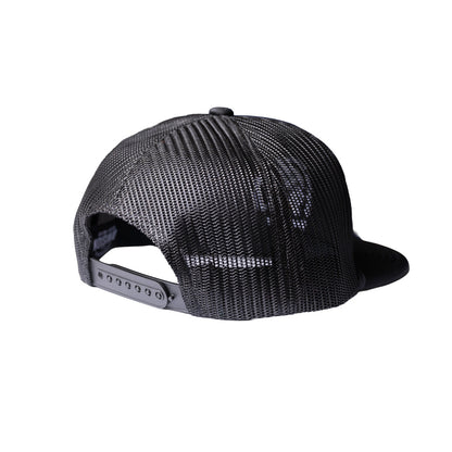 Black trucker-style snapback cap shown from the back, featuring a textured mesh back and a flat brim, on a solid white background.