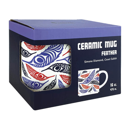 Ceramic mug with feather design in packaging on a white background