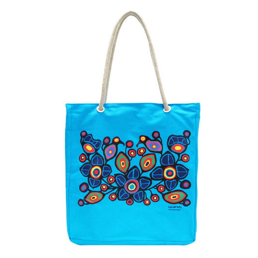 Blue tote bag with colorful abstract design on a white background
