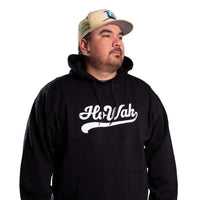 Person wearing a black HoWah hoodie with front logo