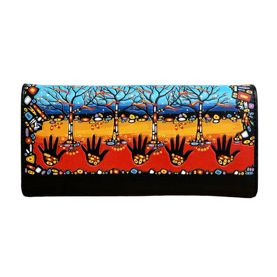 Colorful wallet with artistic design of trees and hands on a white background