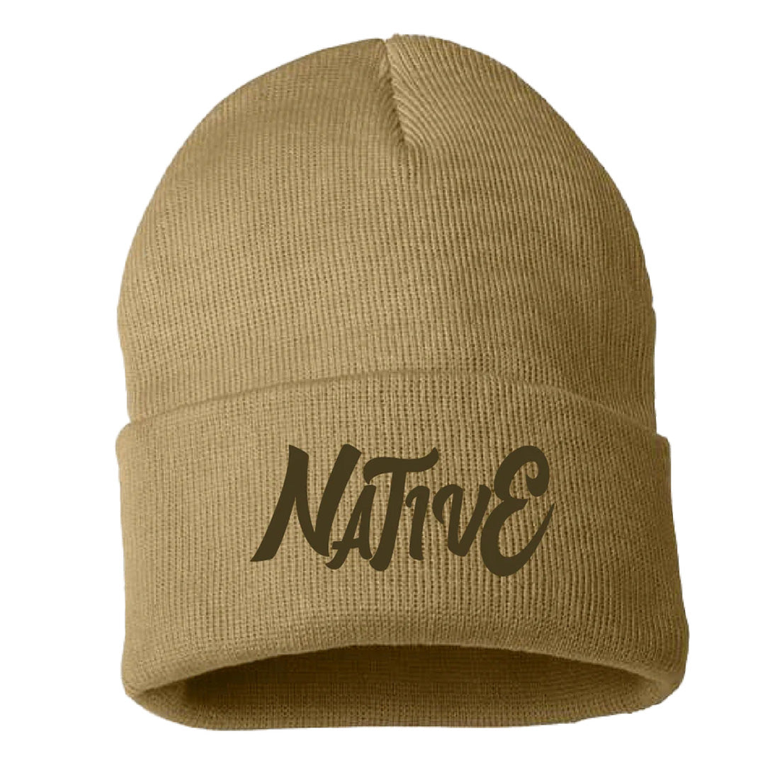 Beige knit beanie with 'Native' embroidery on a white background