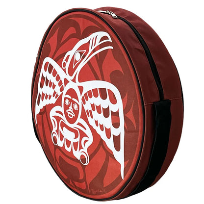 Round red bag with white bird design on a white background