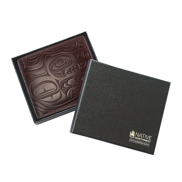 Brown leather wallet with embossed design on a black box, featuring 'Native Northwest' branding.