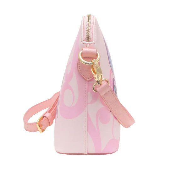 Pink and white patterned handbag with a gold clasp on a white background