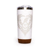 White tumbler with a decorative design and cork base on a white background