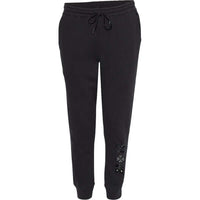 Black joggers with flower embellishments, offering stylish comfort for everyday wear.