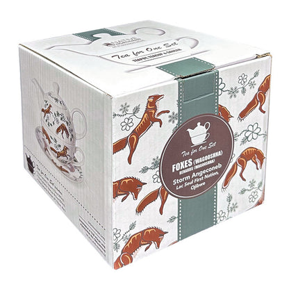A square white cardboard tea gift box with illustrated foxes, floral motifs, and a dark green band. A large oval label on the front reads 'Tea for One Set'.