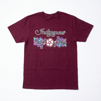 Indigenous Floral Tee featuring a vibrant floral design on a maroon background, perfect for bold and playful individuals.
