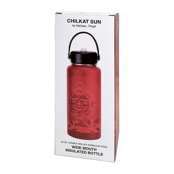 Red insulated bottle with black lid on a white box packaging, featuring 'Chilkat Sun' branding.