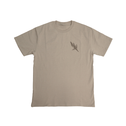 Flat lay front view of Sage Medicine Tee in beige with small chest logo