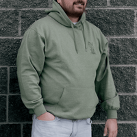 Front view of Sweetgrass Medicine Hoodie in green Indigenous streetwear inspired by tradition