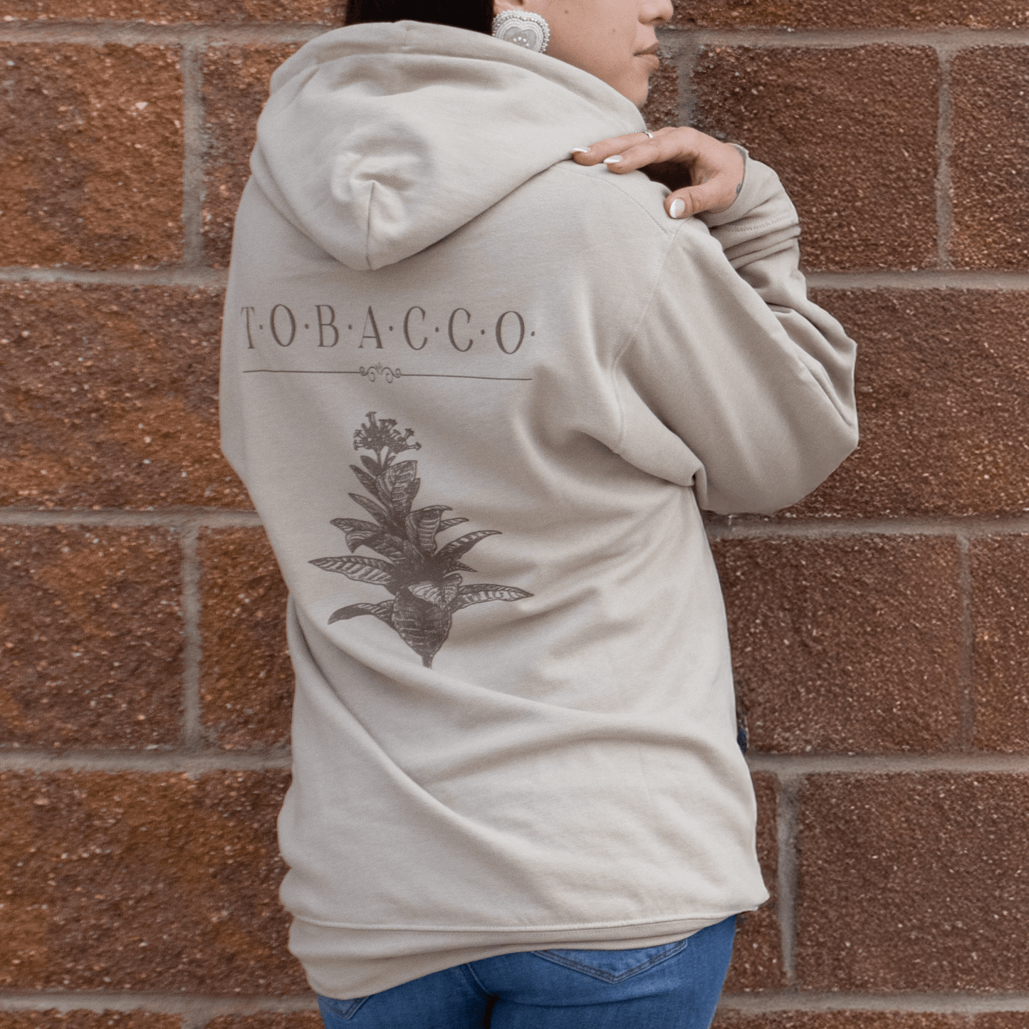 Back view of Tobacco Medicine Hoodie showing hood and print