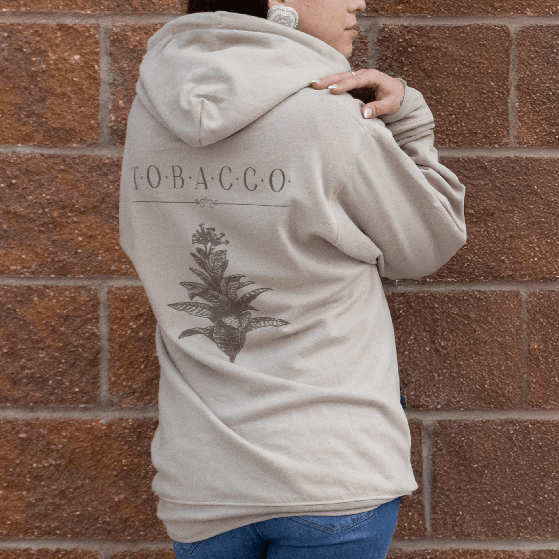 Back view of Tobacco Medicine Hoodie showing hood and print